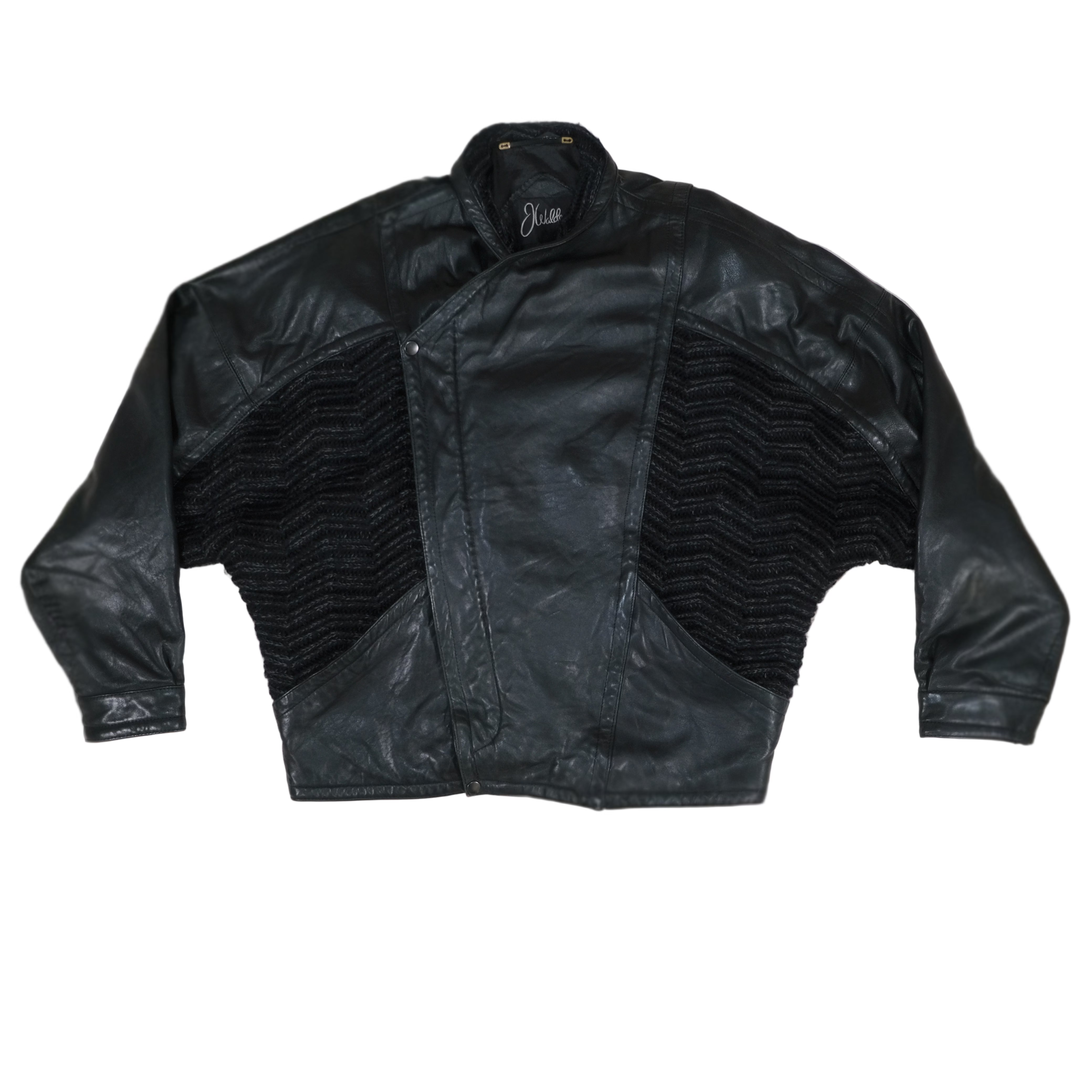 Black leather jacket with a unique pattern on a beige background